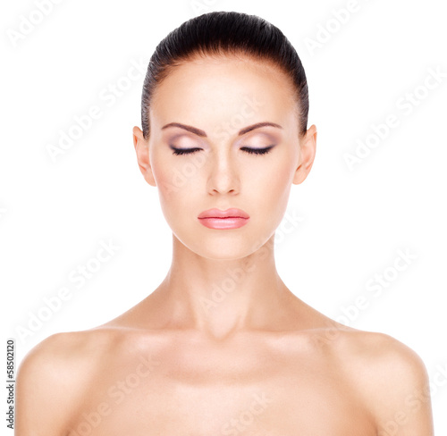 portrait of the beautiful woman's face with closed eye