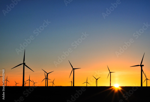 Wind turbines at sunset