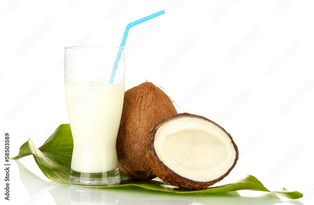 glass of coconut milk and coconuts isolated on white glass of coconut milk and coconuts isolated on white