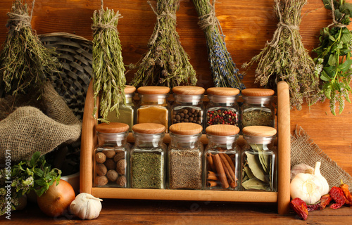 Fototapeta Naklejka Na Ścianę i Meble -  dried herbs, spices and and pepper, on wooden background