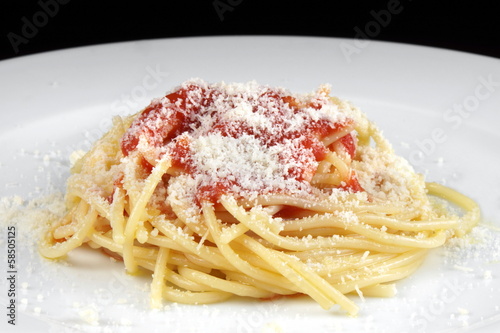 Spaghetti with tomato sauce and parmesan cheese 