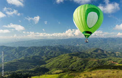Fotografia, Obraz Hot air balloon over the mountain