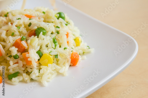 fried rice with butter on white dish