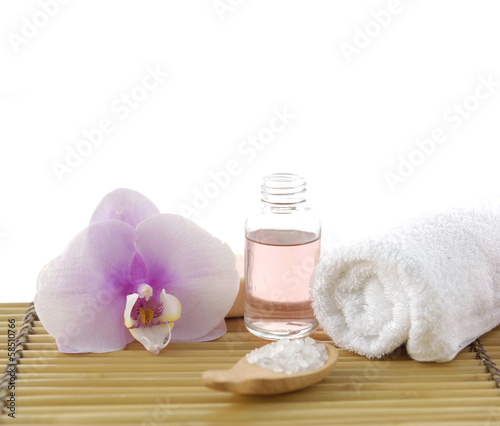flower and Zen rock ,massage oil on mat
