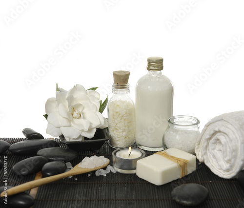 White gardenia with towel  candle and therapy stones