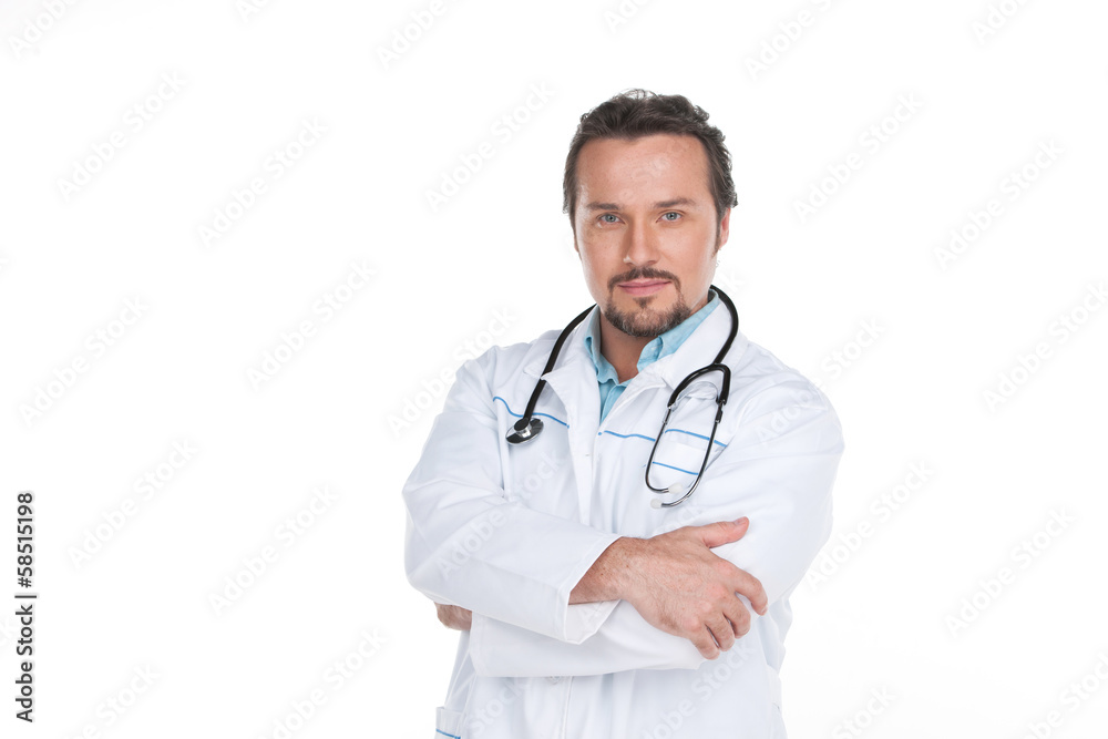 Confident adult doctor standing on white background. Confident adult doctor standing on white background.