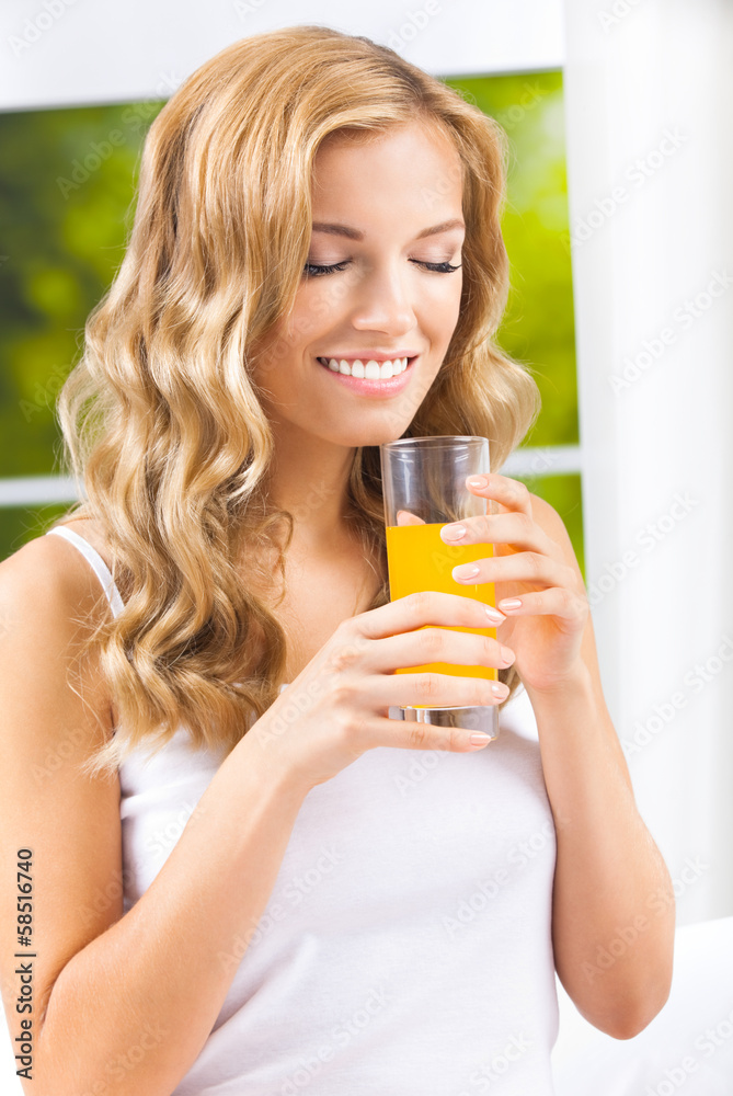Happy woman drinking juice Happy woman drinking juice