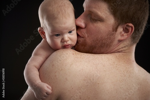 Father and newborn baby