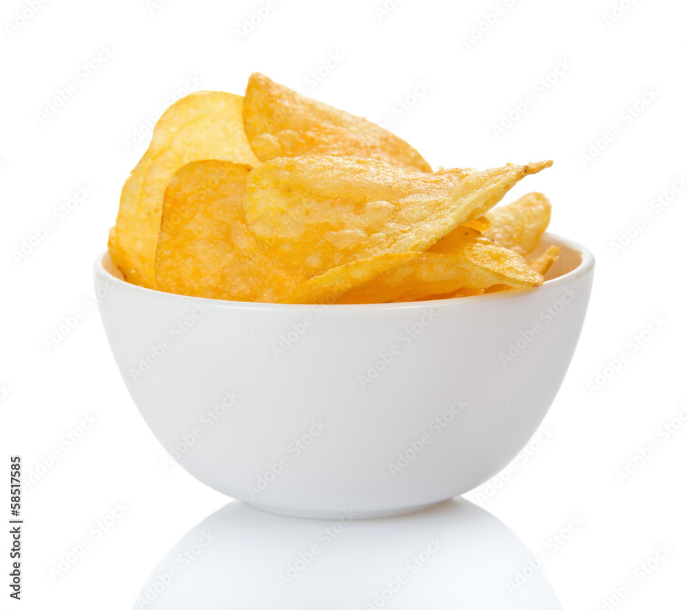 Appetizing golden chips in faience bowl Appetizing golden chips in faience bowl