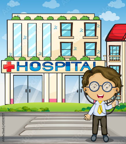 A doctor in front of the hospital