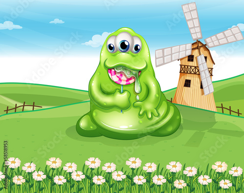 A fat monster at the hilltop with a spiral lollipop candy