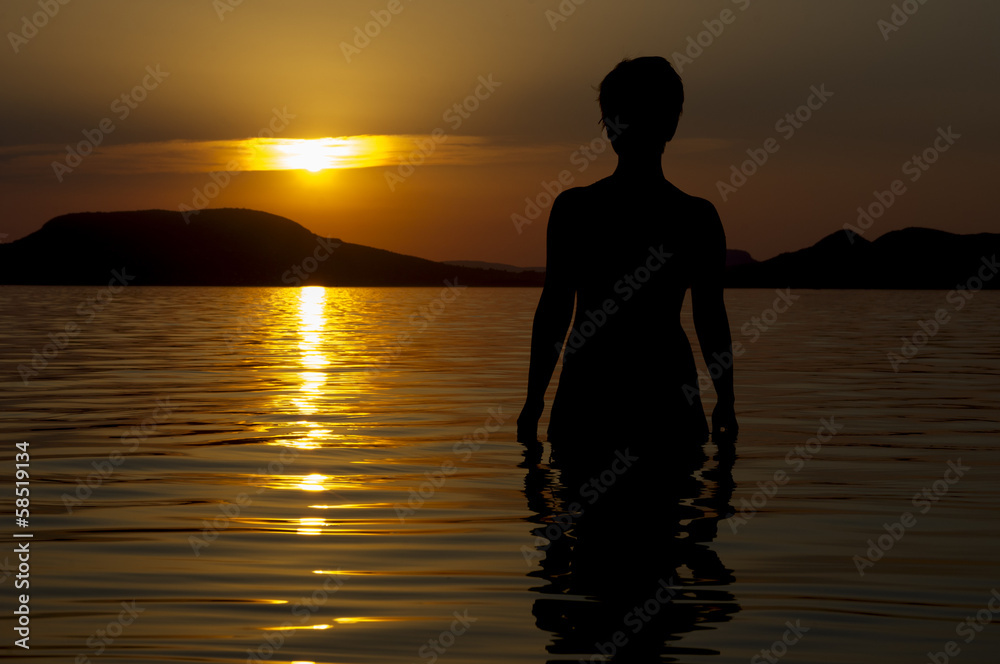 Fototapeta premium Young Girl At Sunset.