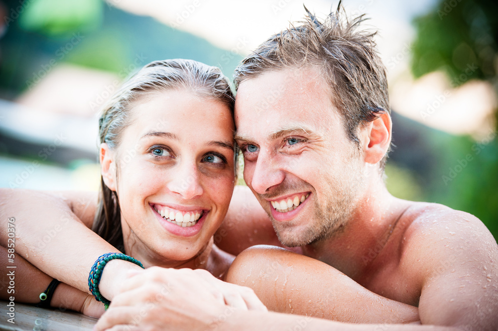 Fototapeta premium couple on the swimming pool have fun