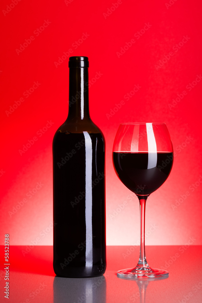 Bottle and glass of red wine Bottle and glass of red wine