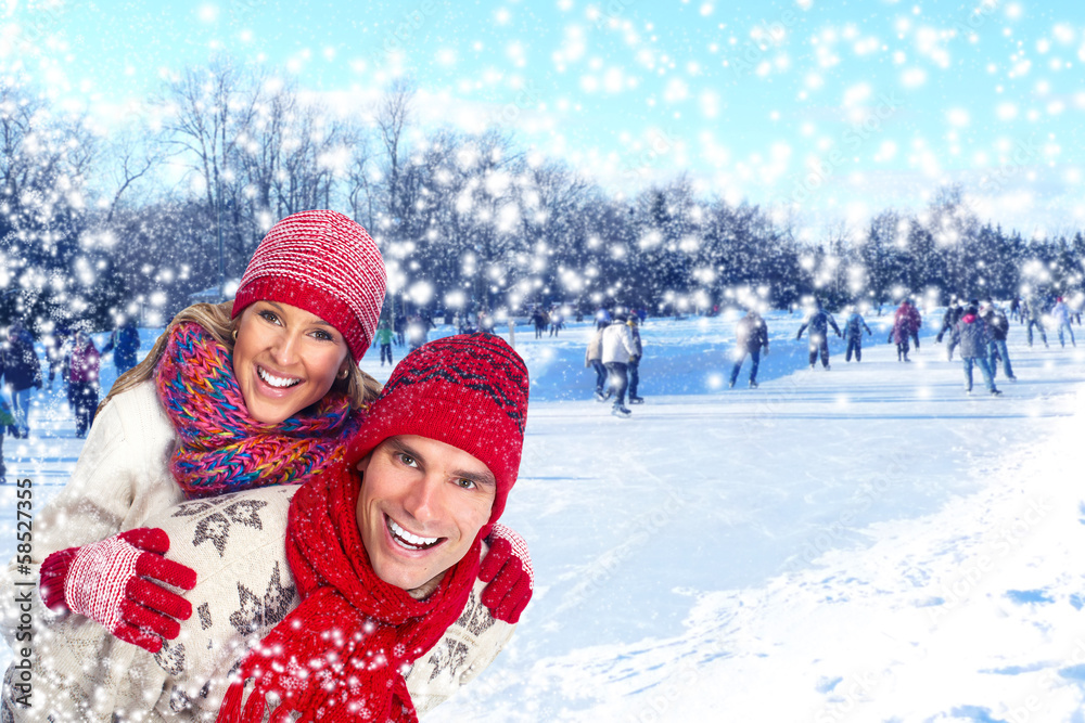 Happy christmas couple in winter clothing. Happy christmas couple in winter clothing.