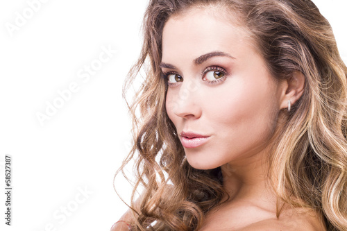 young beautiful woman with long curly volume hair