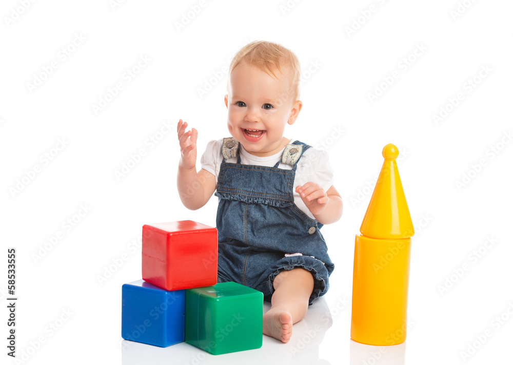 happy cheerful child playing with blocks cubes isolated on white happy cheerful child playing with blocks cubes isolated on white