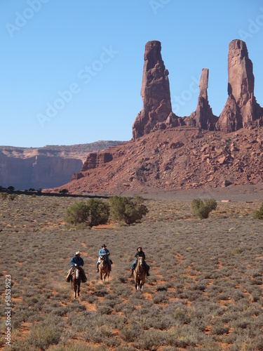 cow boys et Monument valley photo