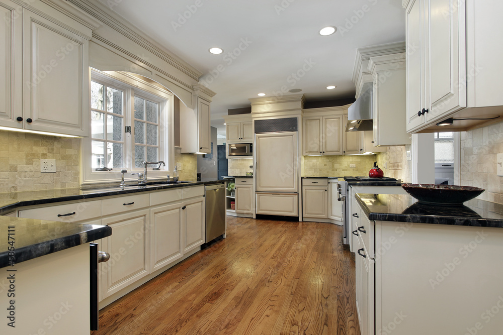 Kitchen with black granite counters Kitchen with black granite counters