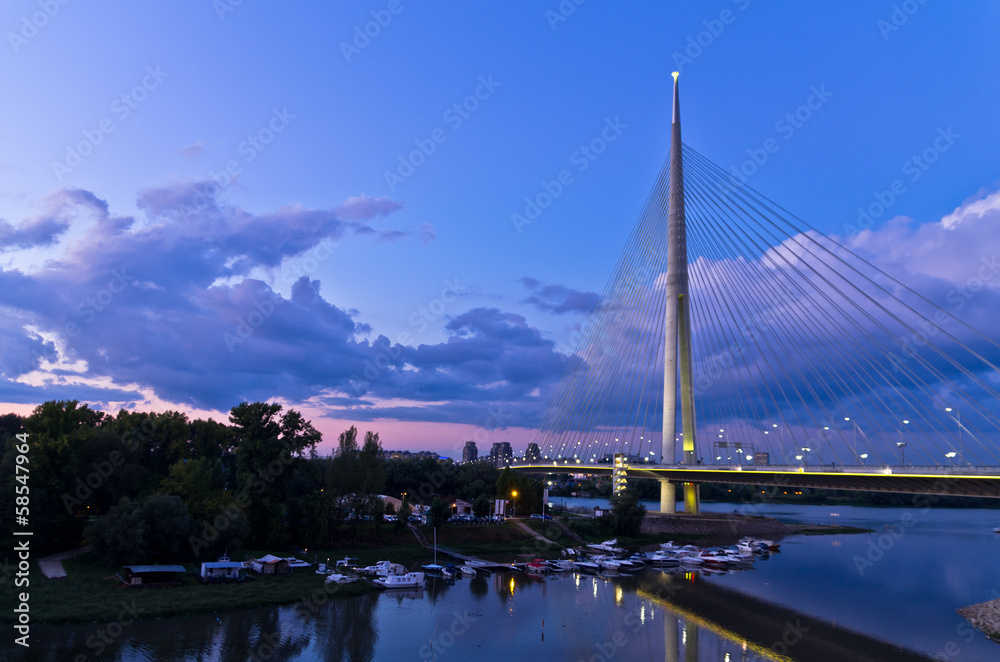 Cable bridge at twilight over Sava river near Ada island