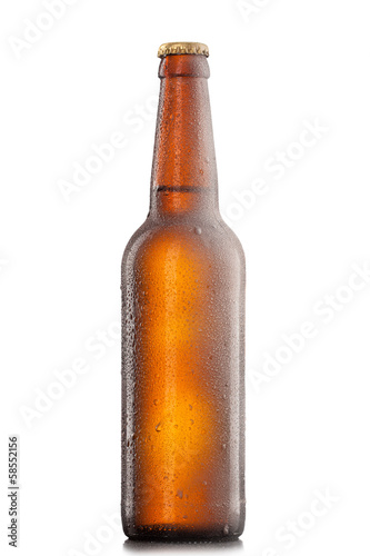 Beer bottle with water drops and frost isolated on white