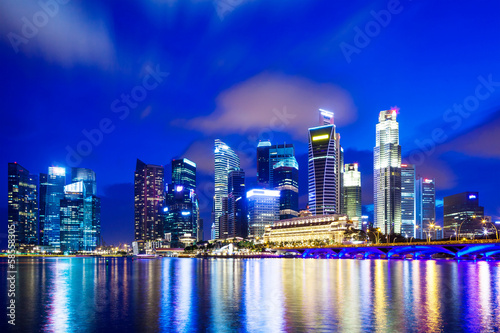 Urban cityscape in Singapore at night © leungchopan
