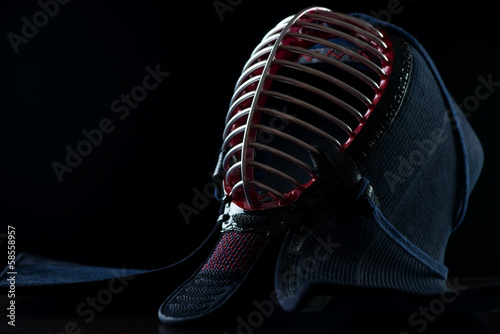 Men: kendo head protection, black background photo