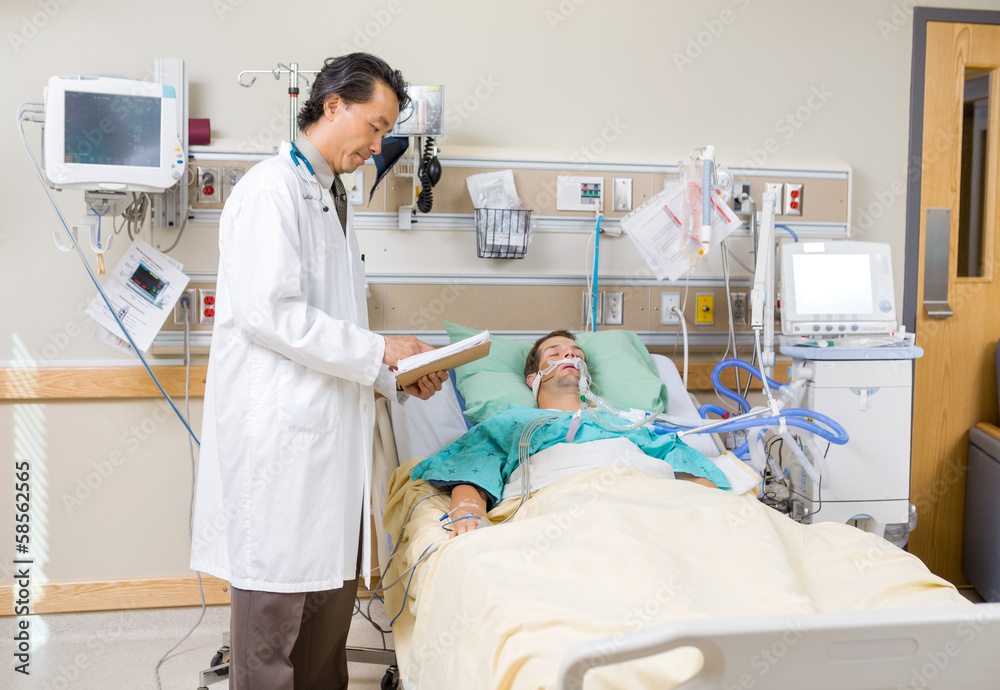 Doctor With Clipboard Examining Patient's Report Doctor With Clipboard Examining Patient's Report
