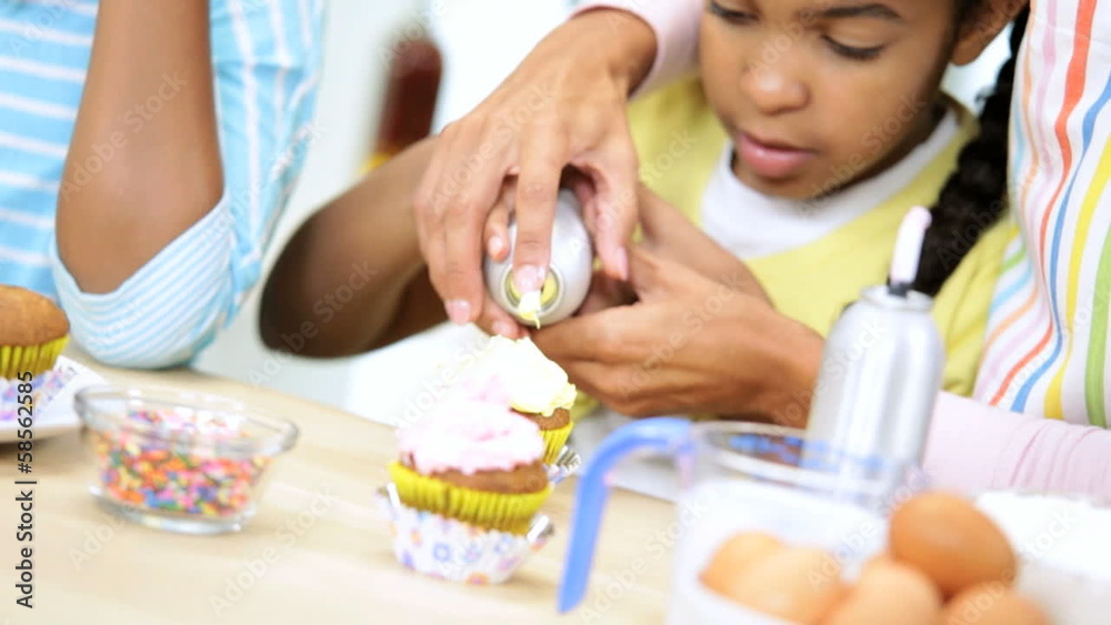 Young Ethnic Girls Mom Icing Cakes Kitchen Young Ethnic Girls Mom Icing Cakes Kitchen