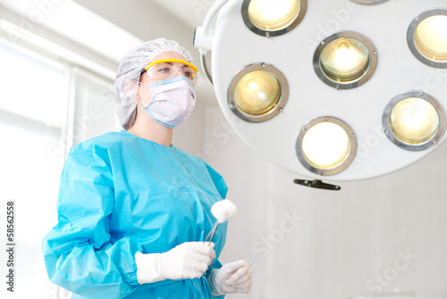 female surgeon in the operating room photo