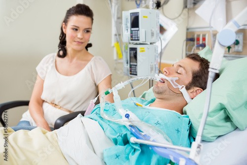 Woman Looking At Patient Resting