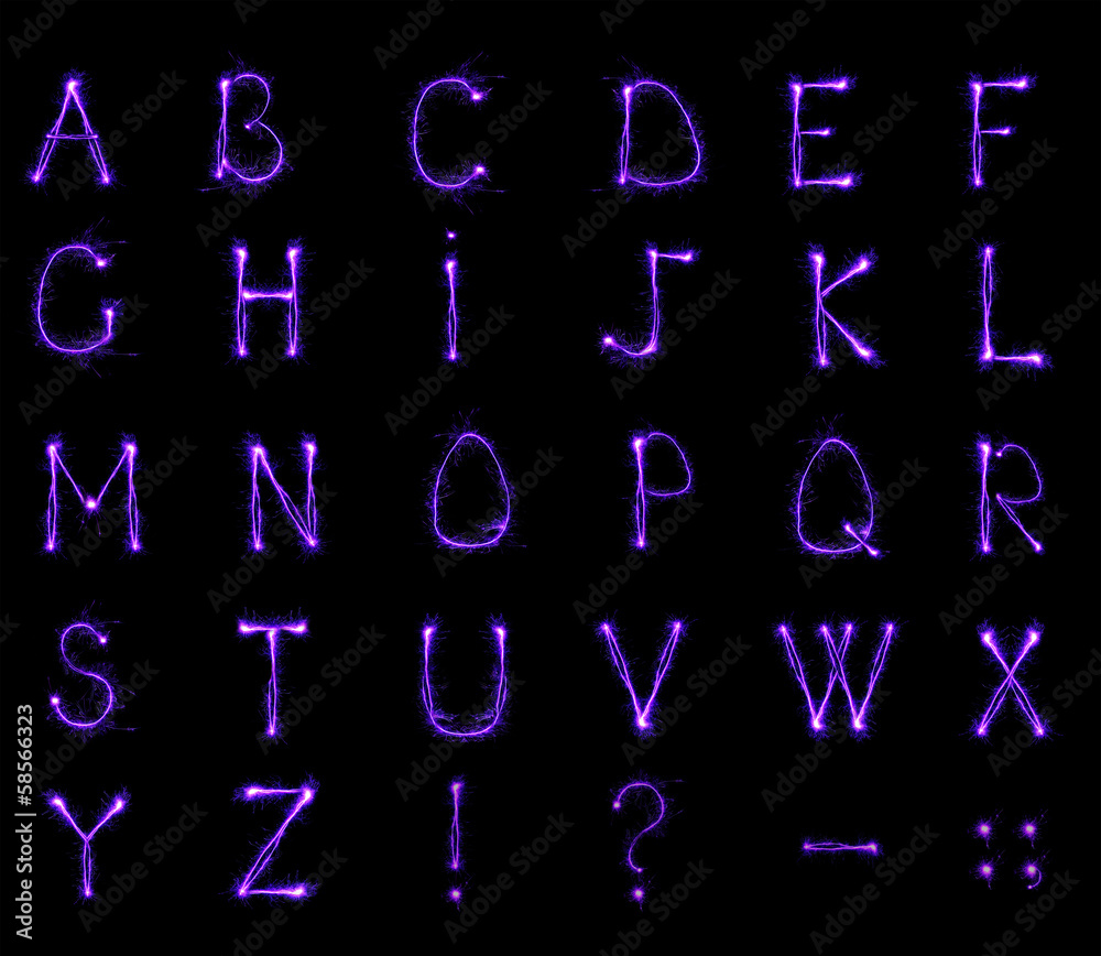 Alphabet sparklers on black background Alphabet sparklers on black background