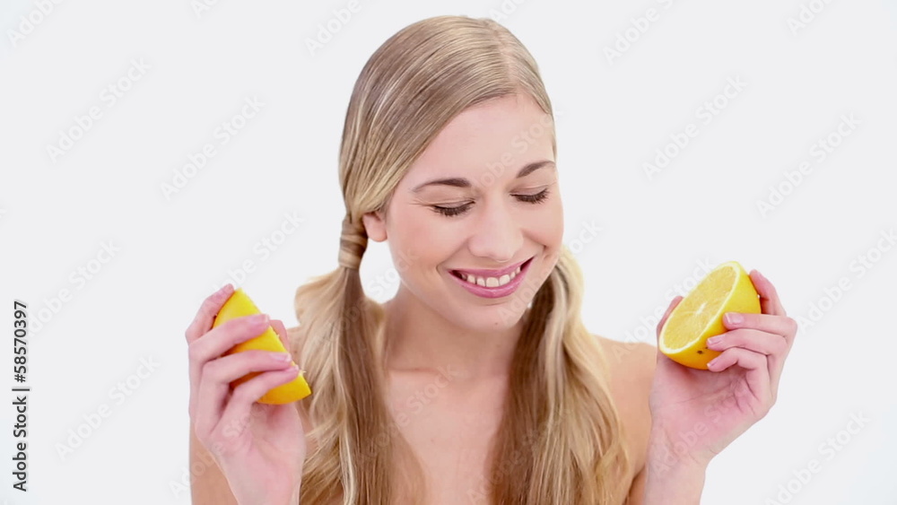 Happy nude blonde smelling orange Happy nude blonde smelling orange