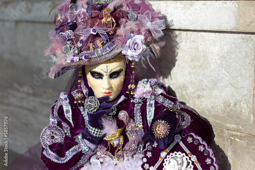Venetian costume attends Carnival of Venice. © Lovrencg