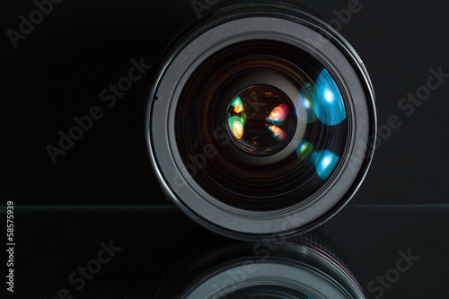 Professional photo lens in dark background