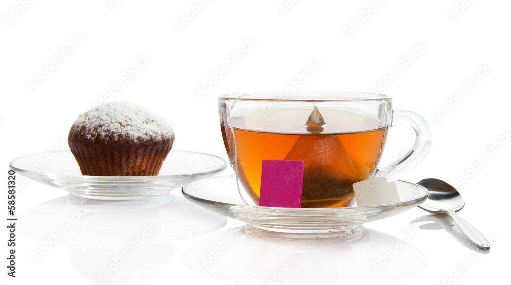 Tea, cupcake on a saucer Tea, cupcake on a saucer