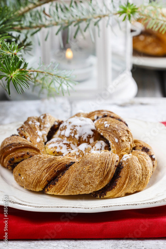 Festive braided bread on wooden table. Beautiful christmas set
