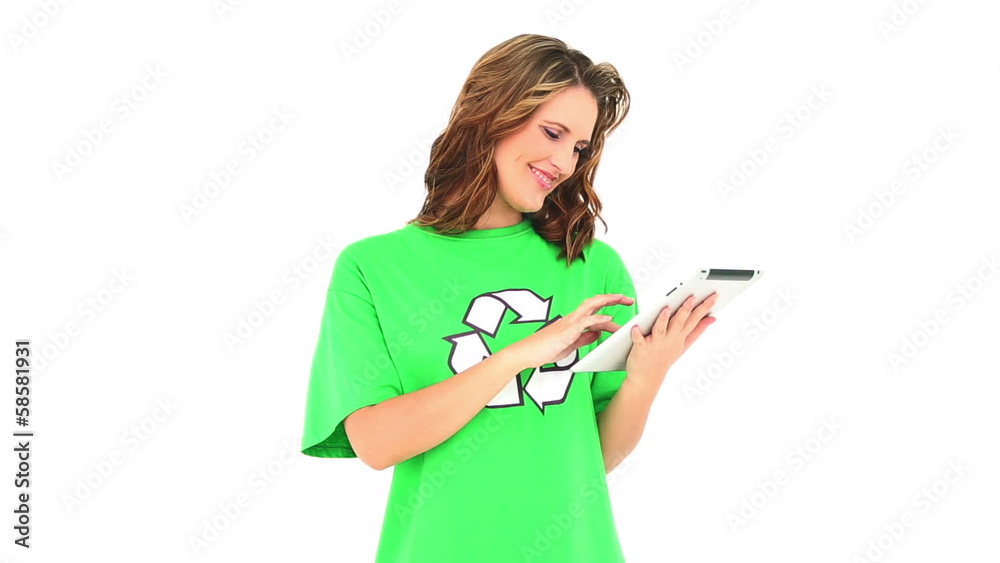 Smiling environmental activist using a digital tablet Smiling environmental activist using a digital tablet