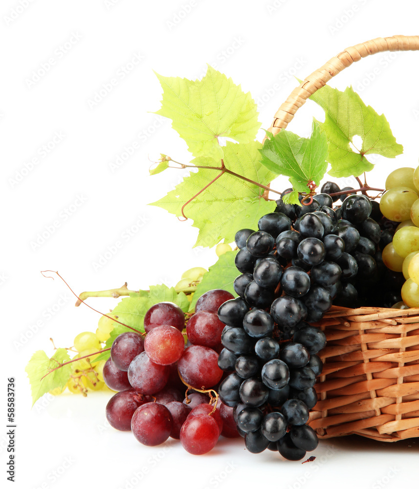 assortment of ripe sweet grapes in basket, isolated on white. assortment of ripe sweet grapes in basket, isolated on white.