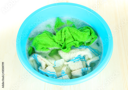 Foto Soaking things in bowl on wooden table