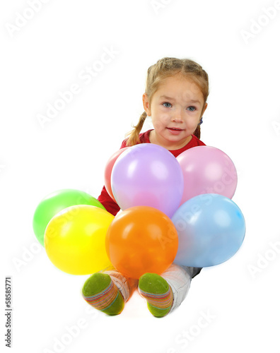 Little girl with colorful balloons isolated on white