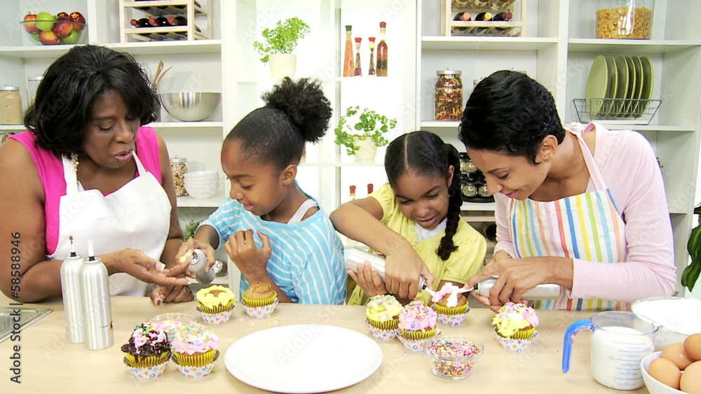 Smiling Little Ethnic Girls Decorating Cupcakes Grandmas Kitchen Smiling Little Ethnic Girls Decorating Cupcakes Grandmas Kitchen