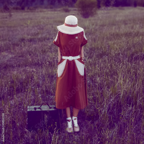 portrait of a girl in a retro style outdoors