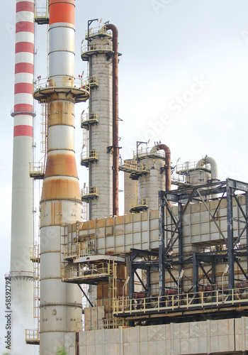 Oil refinery plant with lot of pipes. photo