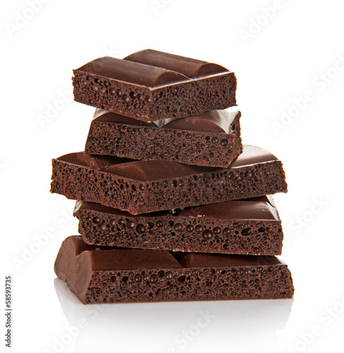 Quadro su tela Slices of black chocolate are put by hill