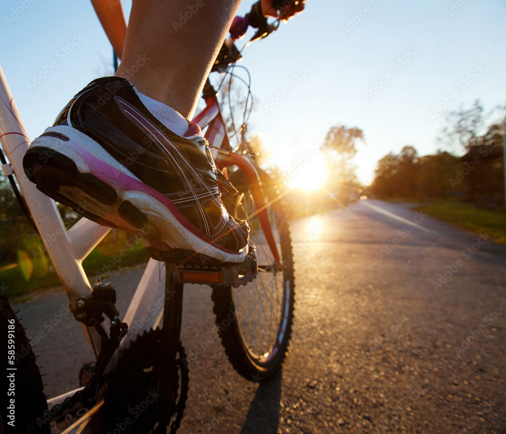 Fototapeta premium foot on pedal of bicycle