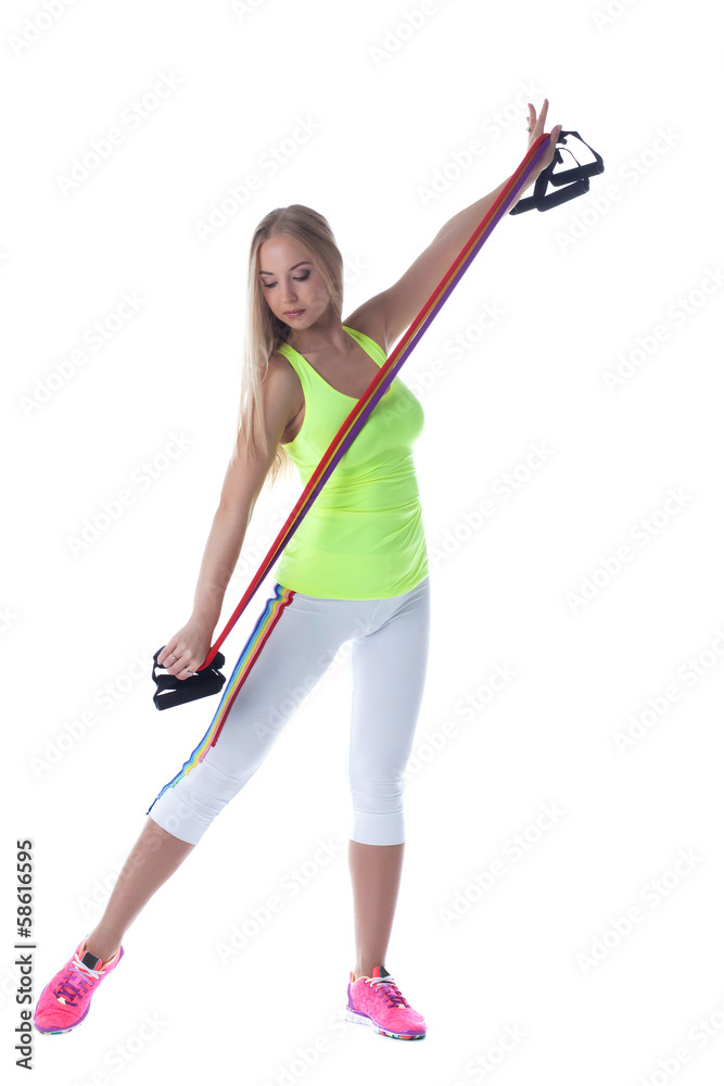 Athletic blonde exercising with stretching trainer Athletic blonde exercising with stretching trainer
