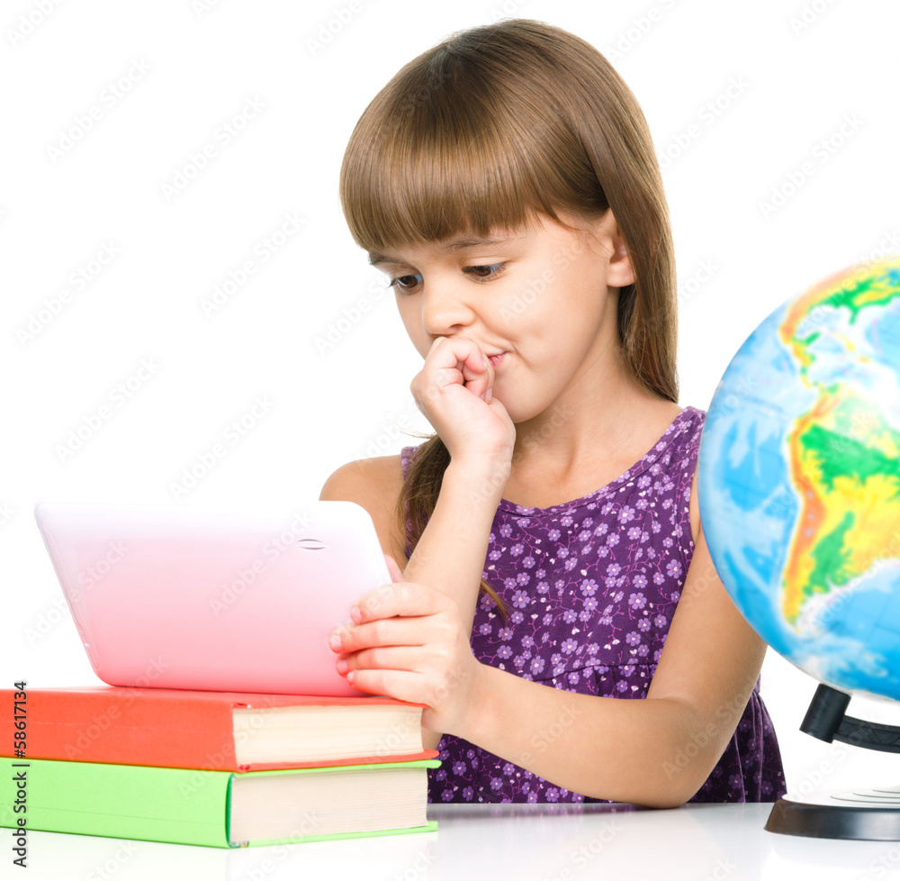 Young girl is using tablet Young girl is using tablet
