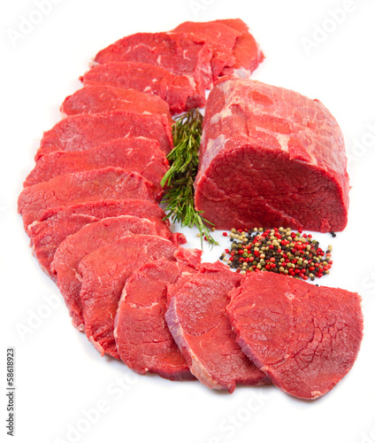 huge red meat chunk and steak isolated over white background