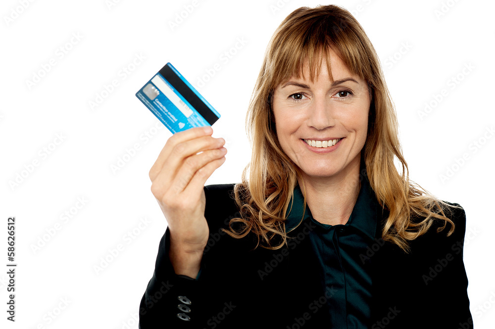 Businesswoman displaying cash card Businesswoman displaying cash card
